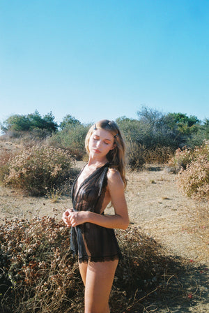 Liz pleated tulle playsuit in black